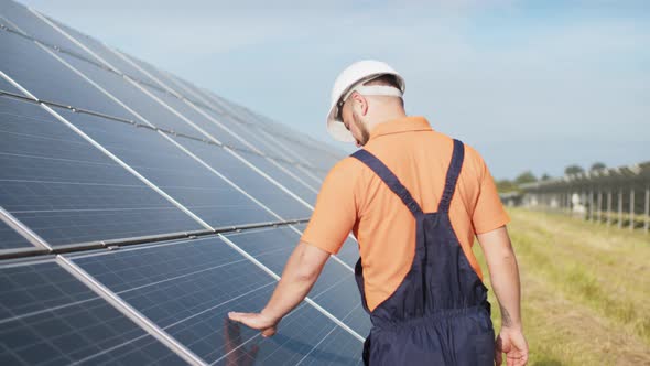 sustainable-green-energy-jobs-solar-panel-technician-working-with-solar