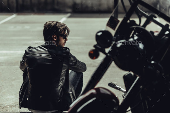 A Man in Black Leather Jacket Sitting Beside the Motorbike · Free Stock  Photo