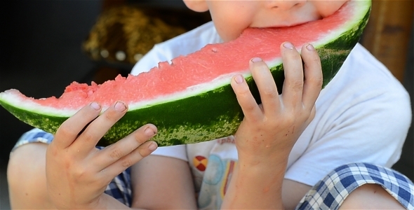 Child Eating Watermelon