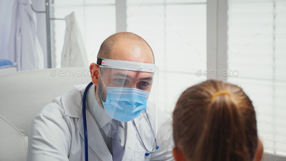Close up of doctor checking the temperature - Stock Photo - Images