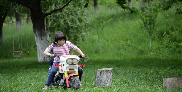 Kids Playing With Motocycle 2