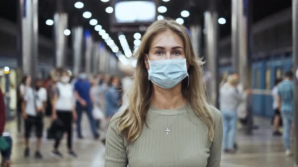 Woman in Mask Walk Crowded Station Metro Coronavirus. Girl Going Subway Covid-19 alt