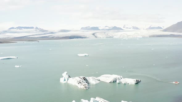 Aerial view of the jokulsarlon lake with the ice melted because of the global warming. alt