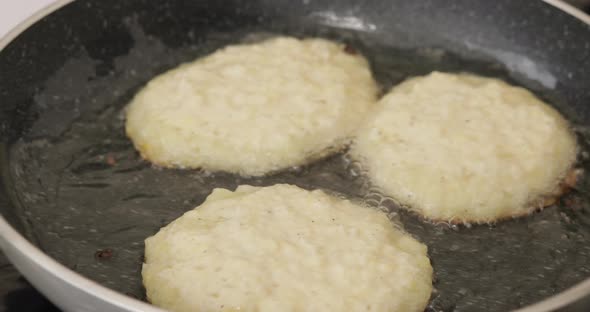  of Frying Latkes or Potato Pancakes.