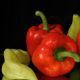 Red And Green Peppers Rotating On Black Red And Green Peppers Rotating On Black - VideoHive Item for Sale
