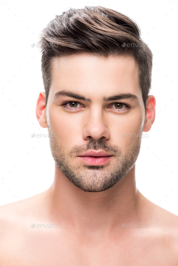 handsome young man looking at camera isolated on white - Stock Photo - Images