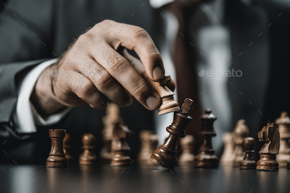 Man Holding Chess Piece · Free Stock Photo