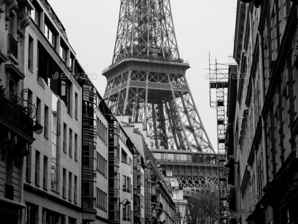 Paris street scene with Eiffel Tower in the background in France