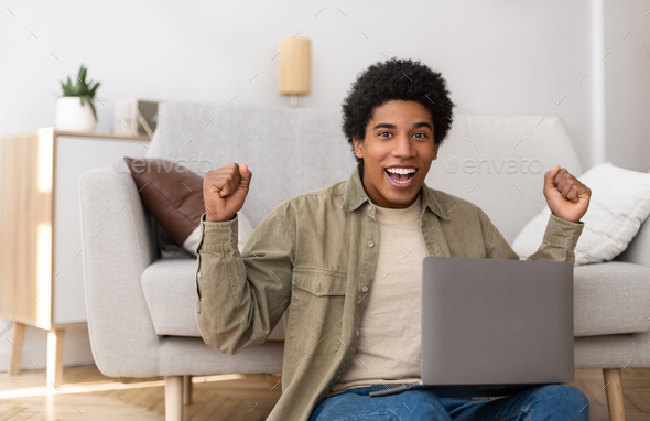 Having Fun at Home. Cheerful Black Teen Guy with Joystick Playing Online  Computer Games, Sitting on Couch Indoors Stock Image - Image of computer,  person: 227478857