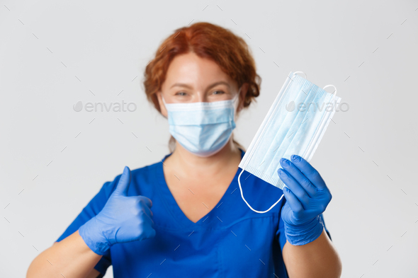 Medical workers, covid-19 pandemic, coronavirus concept. Close-up of professional female nurse - Stock Photo - Images
