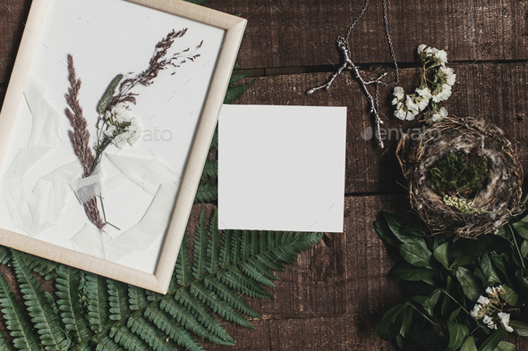 wedding invitation mock-up and rustic boutonniere under glass frame