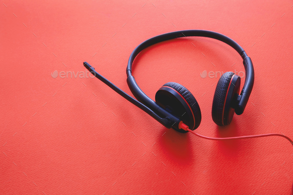 Headset on black background. Call center, home office, customer service  support, help desk Stock Photo by rawf8