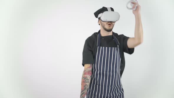 Chef Experiencing Virtual Reality Using VR Headset Glasses, Playing Game  alt