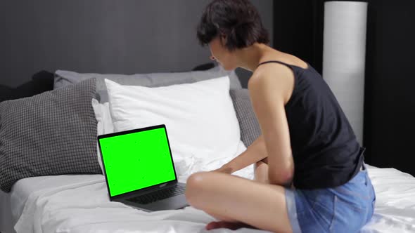 Laptop with Green Screen for Woman