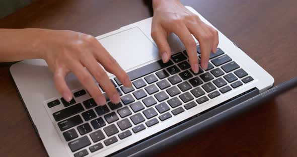 Woman work on her laptop computer alt