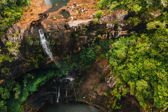 Aerial view from above of the Tamarin waterfall seven cascades in the tropical jungles of the island