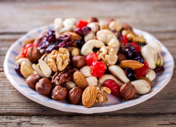 Nuts and dried fruit mix. Concept of Healthy Food. - Stock Photo - Images