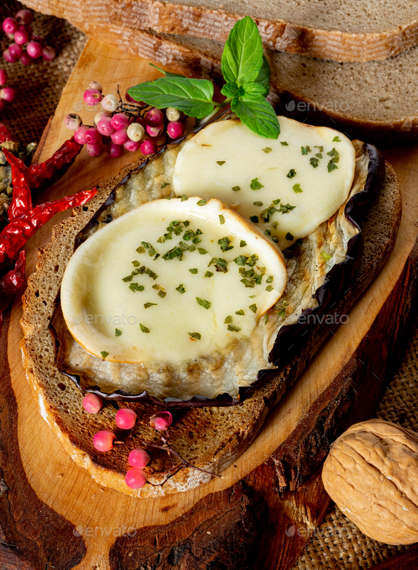 baked eggplant slices with cheese - Stock Photo - Images