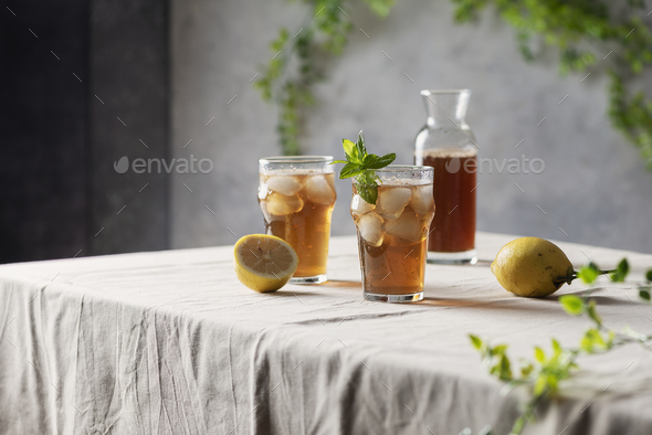 Cold summer tea with lemon and mint - Stock Photo - Images