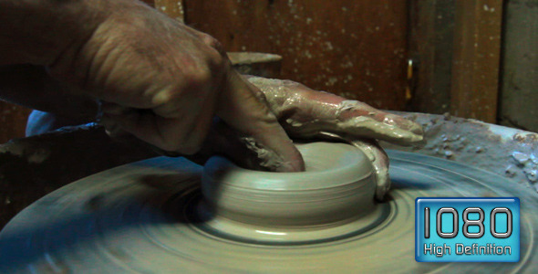 Ceramics Artist Starts Bowl On Potters Wheel