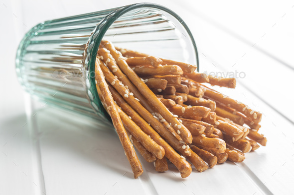 Salty sticks. Crunchy pretzels in glass. - Stock Photo - Images