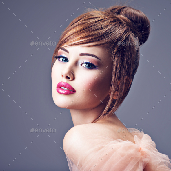Beautiful redhead girl with style hairstyle. - Stock Photo - Images