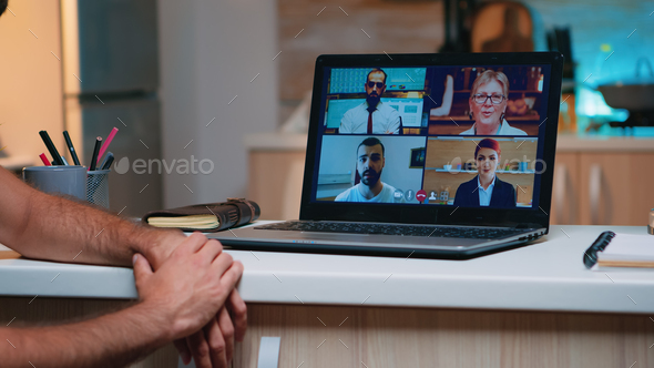 Remote employee having video conference working from home