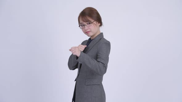 Young Beautiful Asian Businesswoman Ready To Fight alt
