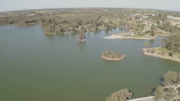 Aerial drone view of the river fluvial beach of Mina de Sao Domingos, in Alentejo Portugal alt