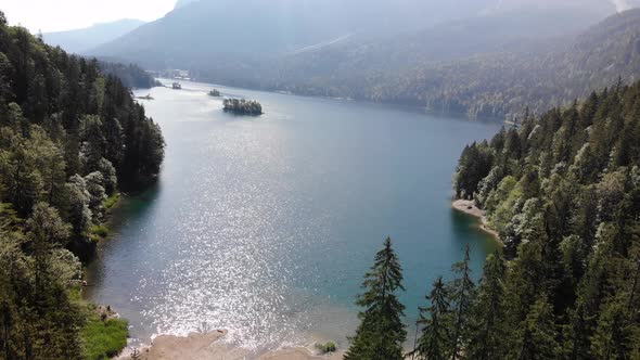 beautiful drone video of an lake and mountains, eibsee in bavaria alt
