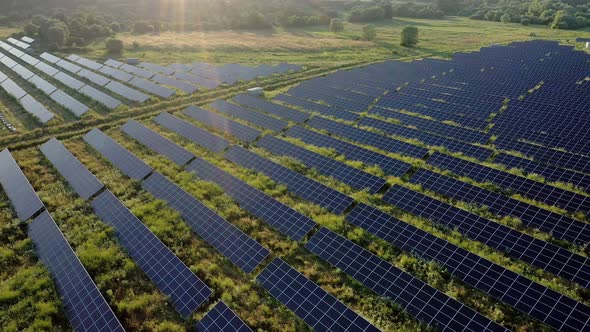 View of a solar power plant, rows of solar panels, solar panels, top view of a solar power plant alt