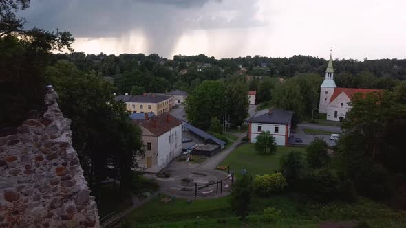 Medieval Castle Ruins in Latvia Rauna. Aerial View Over Old Stoune Brick Wall of Raunas Castle  alt
