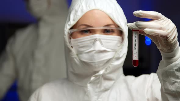 Scientist Holding Coronavirus Test Sample