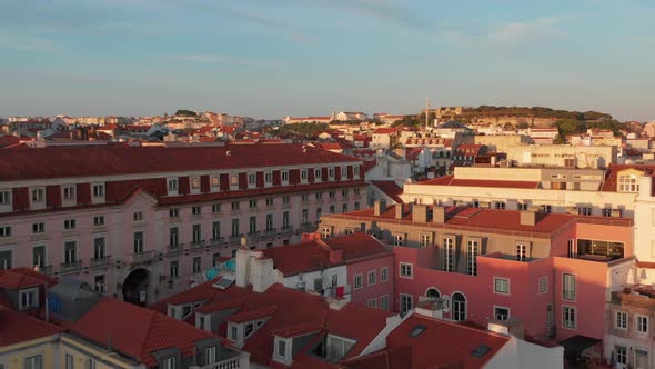 Elevated Evening View of Bright Sun Illuminated Buildings Downtown alt