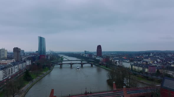 Fly Above Wide River in City alt