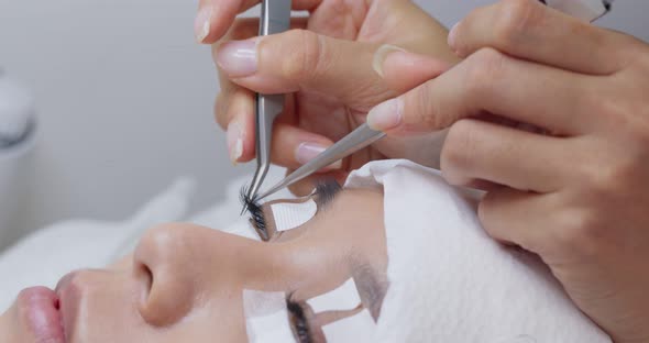 Woman with Long Eyelashes Extension