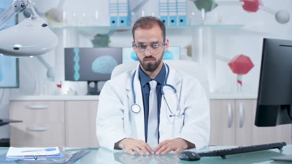 Augmented Reality Concept of Doctor Wearing AR Glasses and Working in Virtual Space alt