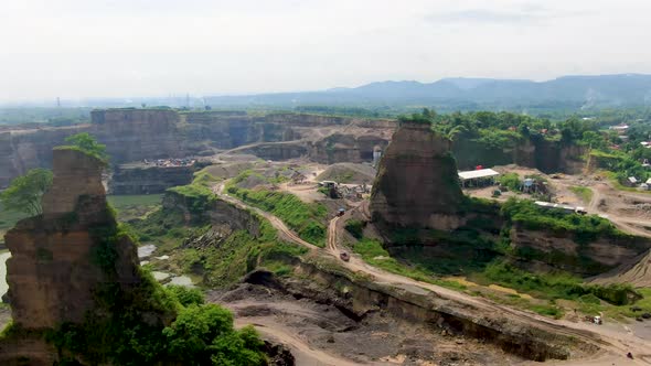 Brown Canyon opencast mine in Java, Indonesia, aerial revealing quarry landscape alt
