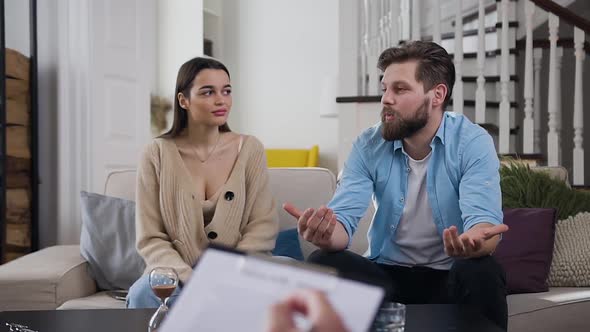 Couple Visiting the Psychologist Office and Talking about their Problems in Joint Family alt