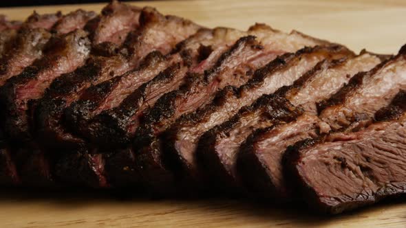 Rotating Shot of Delicious Smoked Brisket alt