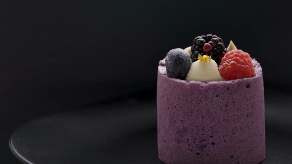 Purple berry mousse cake with blackberry and raspberry