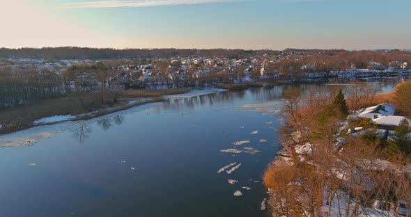 Aerial view residential houses covered snow with houses and roads at landscape alt