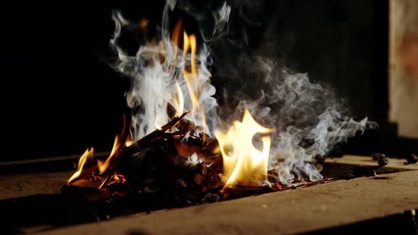 Burning fire at fireplace for blacksmith work alt