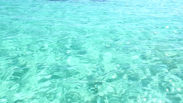 View From Boat to Crystal Clear Turquoise Sea Water with Coral Reef alt