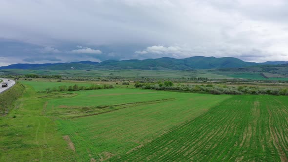Cloudy weather in a mountain valley. Aerial view.