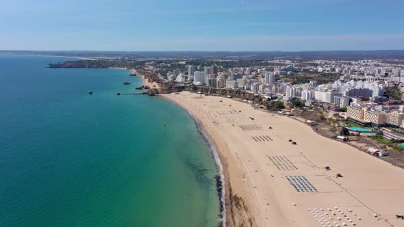 Beautiful Aerial Views of the Portuguese Southern City of Portimao Over the Stunning Beaches and alt