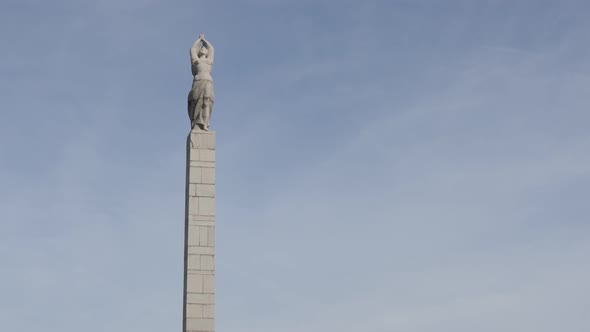 VIDIN, BULGARIA - OCTOBER 10, 2017 Western Bulgarian town sculpture from communism era on column slo