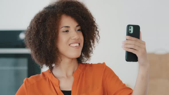 African American Girl Blogger Influencer Woman Records Video Blog Shooting Vlog Online Streaming alt