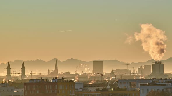 Timelapse during sunrise in Munich. Munich during sunrise with the alps in the background.