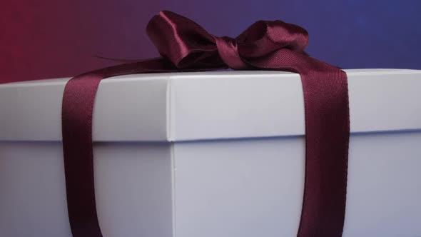 White Present Carton Box with Purple Ribbon and Bow alt